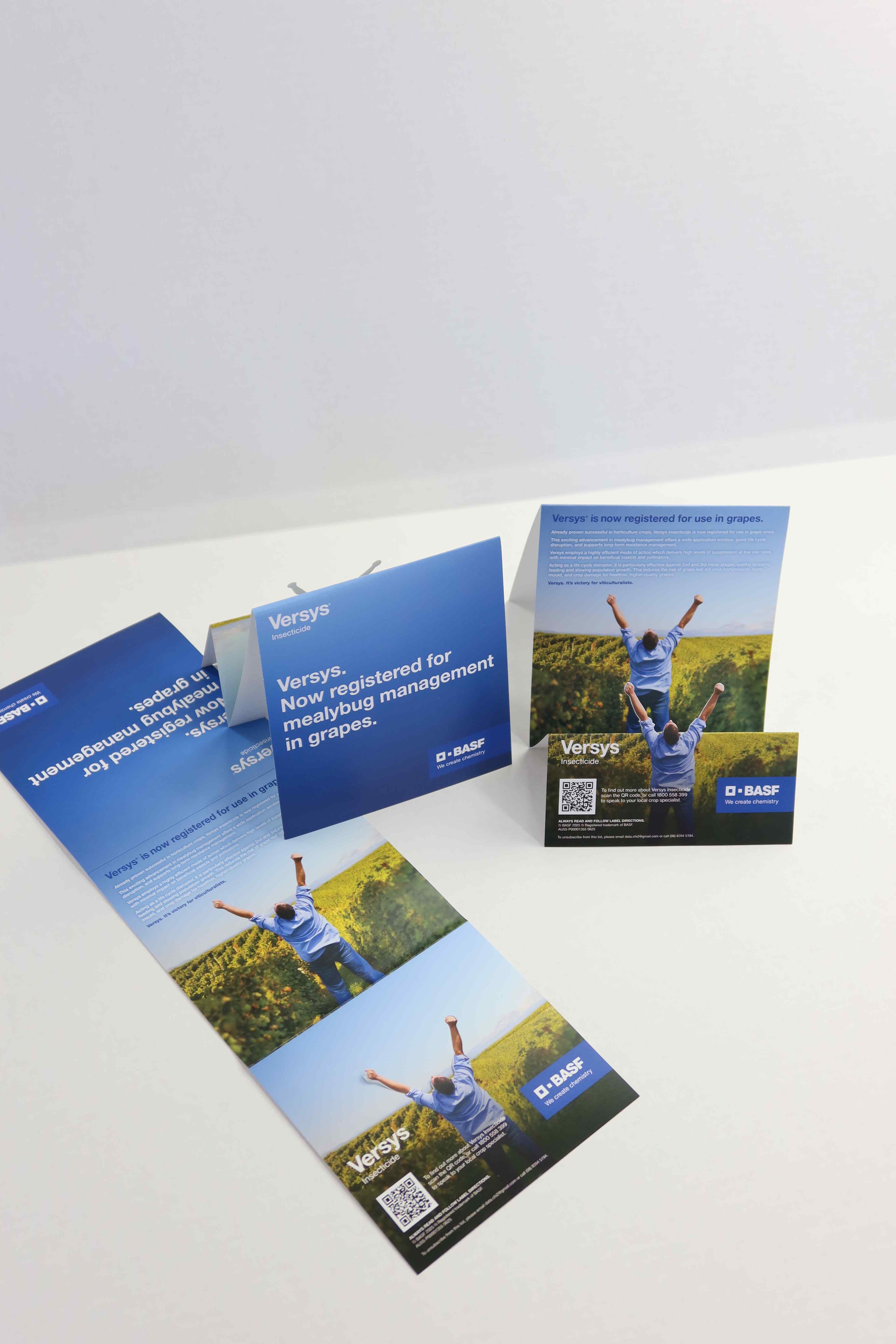 Printed brochures and books on a workbench